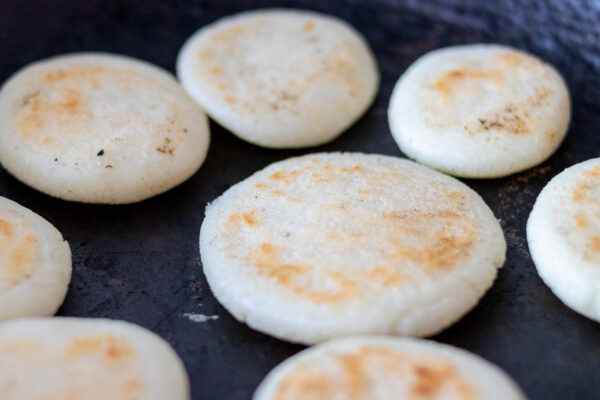 Cooking arepas in the pan