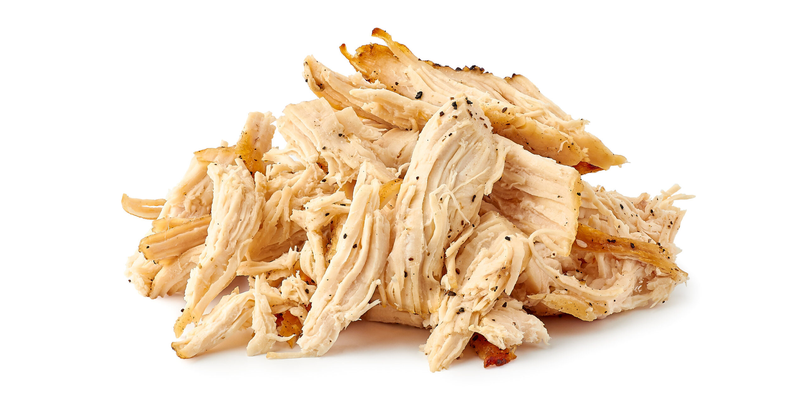 Heap of pulled chicken meat on white