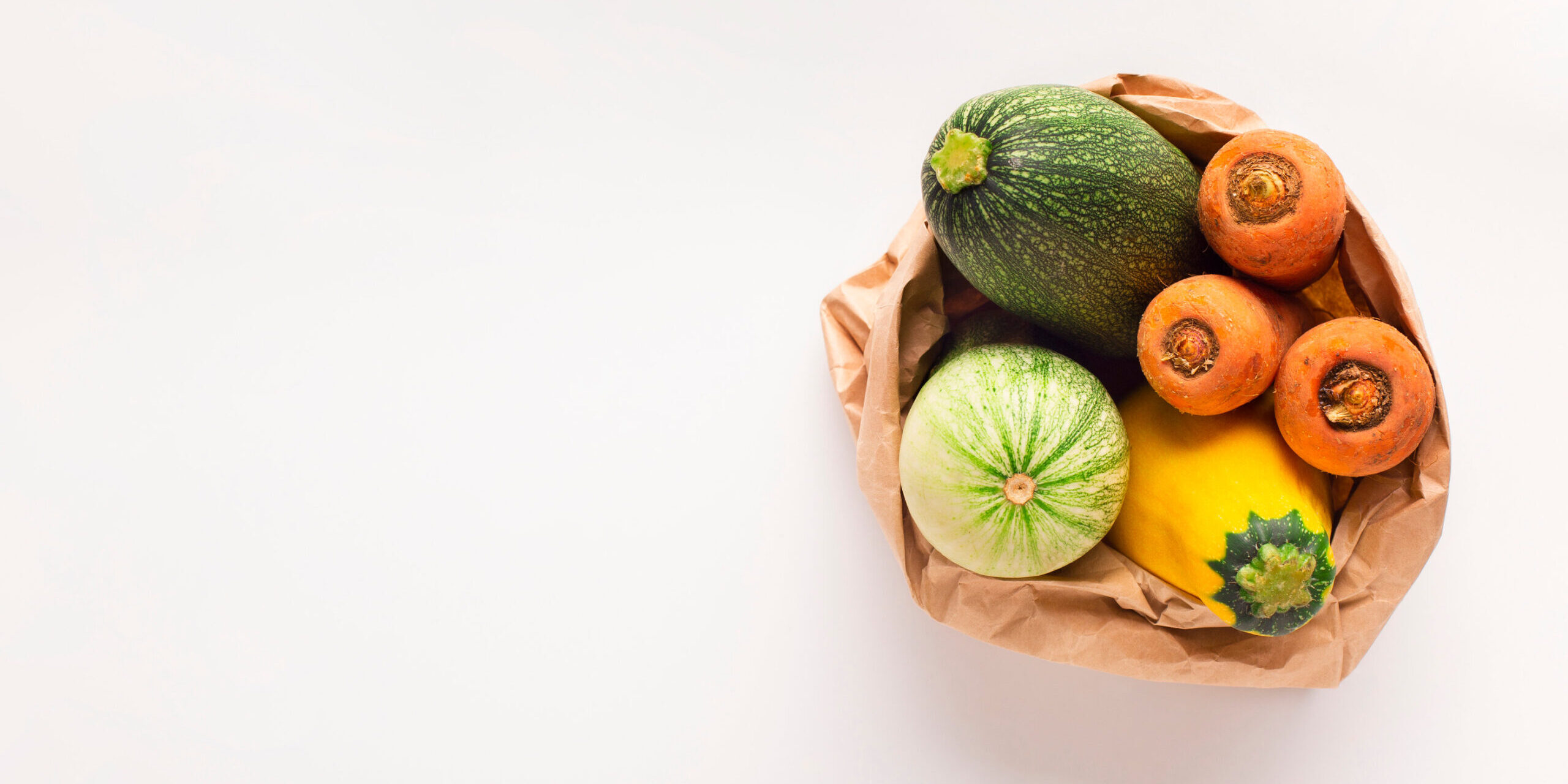 Fresh and tasty zucchini, carrots and squash in zero waste bag