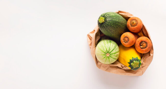 Fresh and tasty zucchini, carrots and squash in zero waste bag