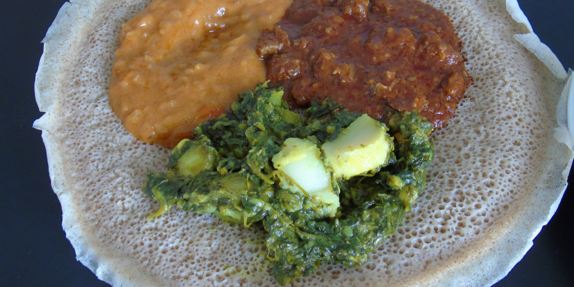 Injera with stews and sauces 2 28 2022 copy